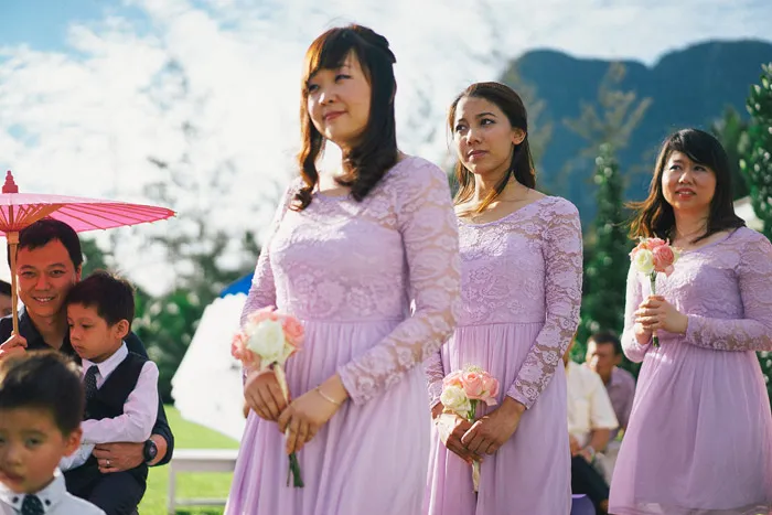 Purple bridesmaids. Photo by Fabulous Moments. theweddingnotebook.com