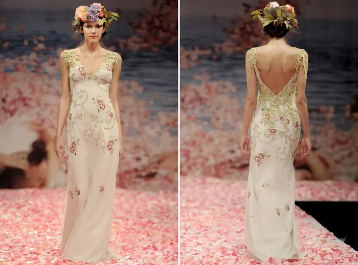 Claire Pettibone 2013 Fall Collection – Olivia. Red rose and olive embroidery lined in stone linen with guipure vine shoulders and back. theweddingnotebook.com