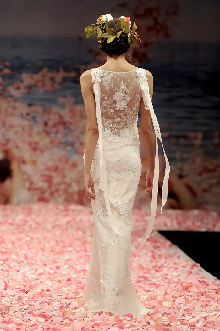 Claire Pettibone 2013 Fall Collection – Aphrodite. Ivory beaded lace gown with blush silk lining and ribbons streaming from the shoulders. theweddingnotebook.com