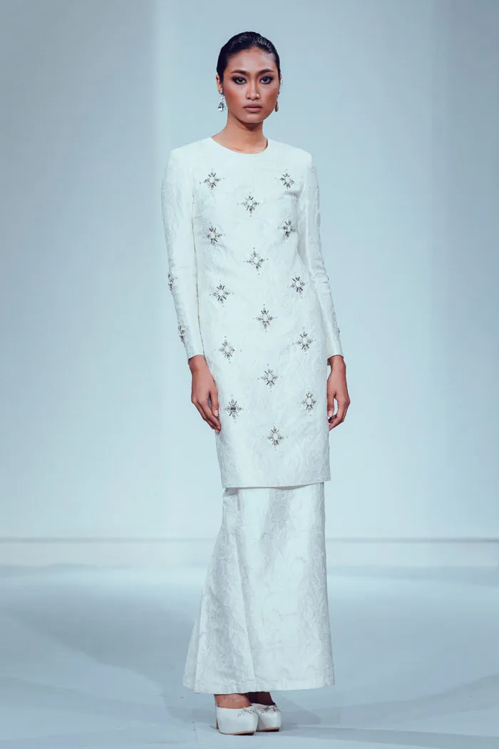 Photo by Funkydali/WAF. Innai Red 2015 Bridal Collection. theweddingnotebook.com