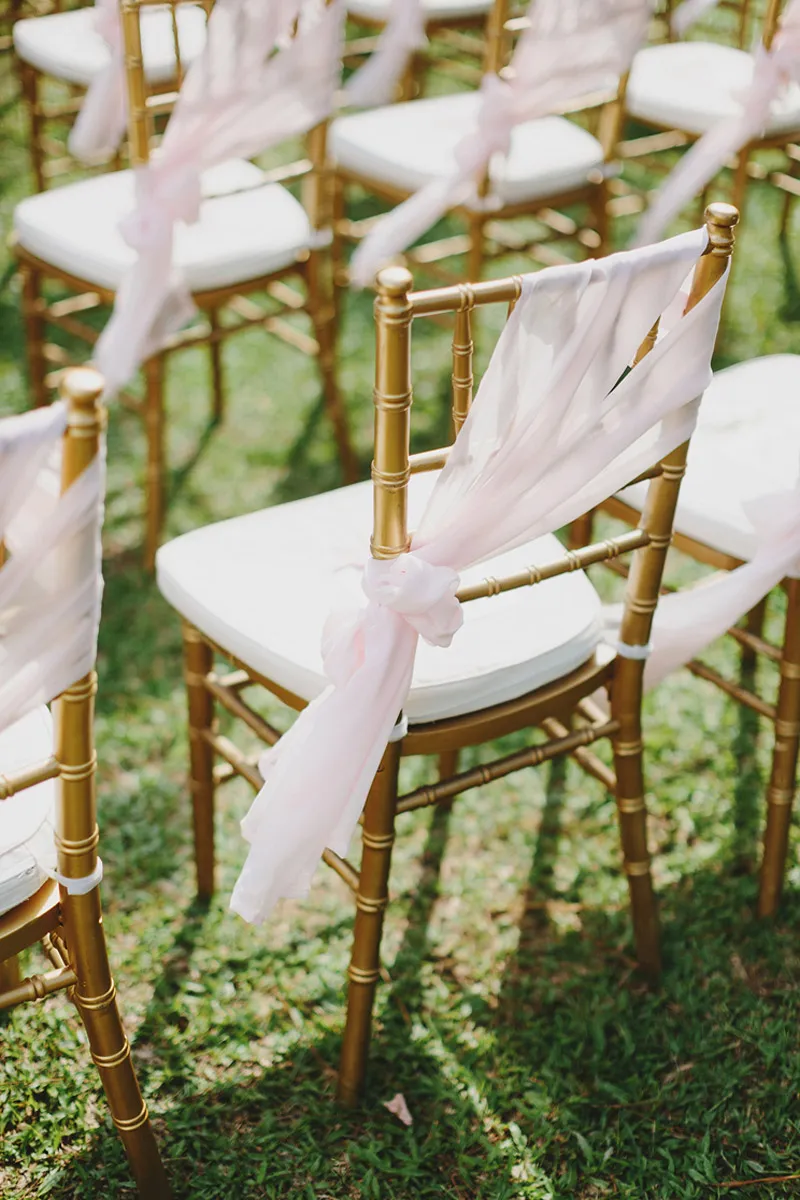 Chair decor. Photo by Jonathan Ong. theweddingnotebook.com